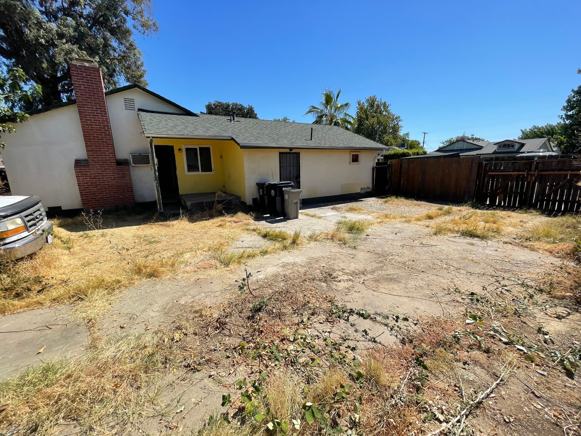 Backyard Property Cleanout after Long's Trash Hauling