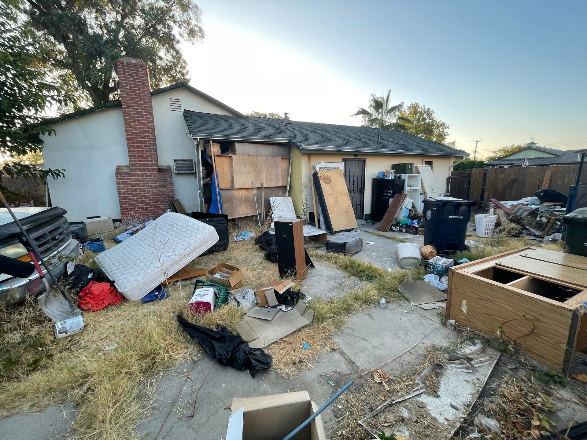 Backyard Property Cleanout before Long's Trash Hauling